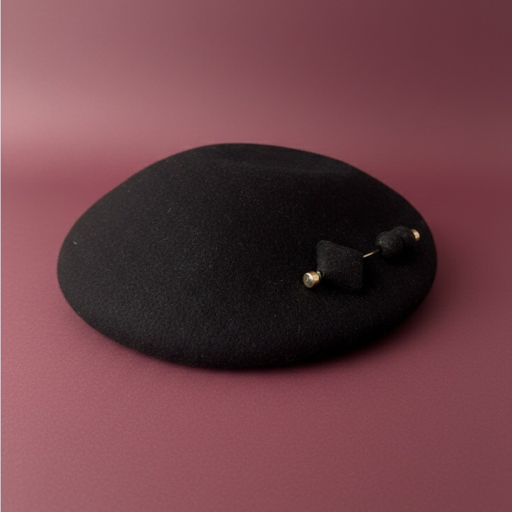 Elegant Black Beret with Decorative Pin
